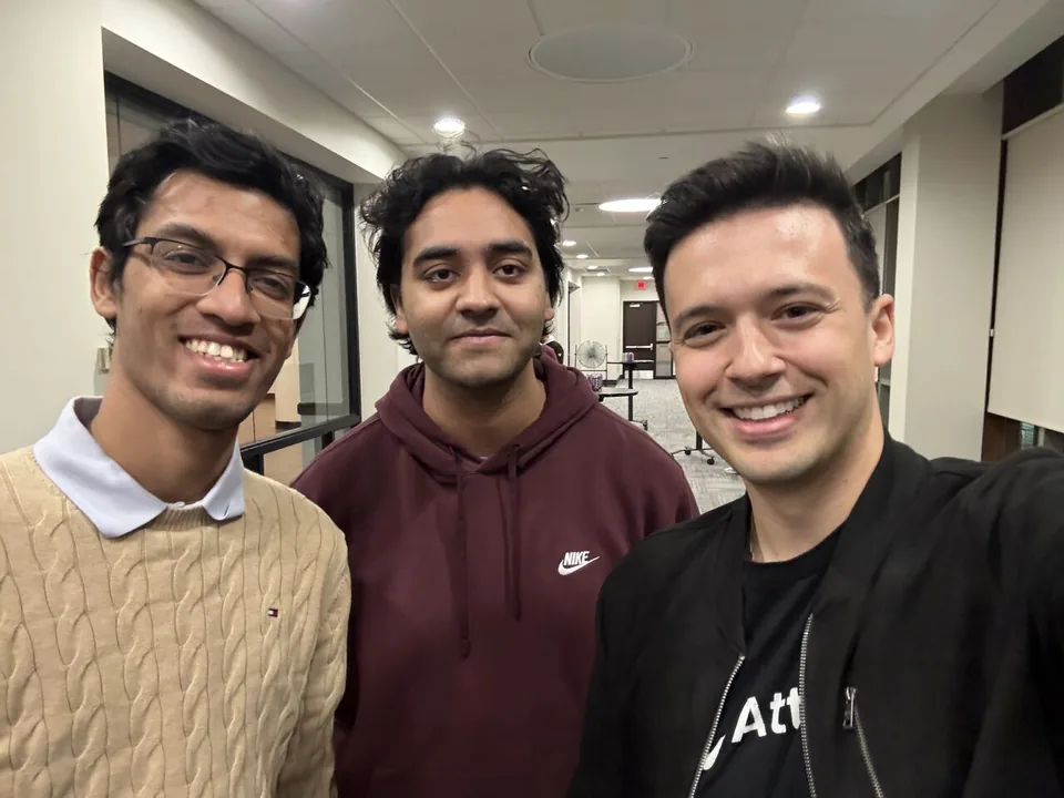 Three people posing at Gopher AI Demo Night on April 9, 2026 at Coffman Memorial Union